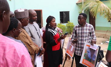 Participant explaining his lived experience through a photo