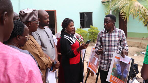 Participant explaining his lived experience through a photo